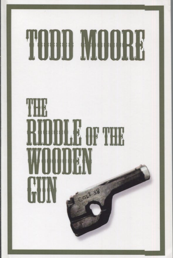 Item #21433 THE RIDDLE OF THE WOODEN GUN. Todd Moore.